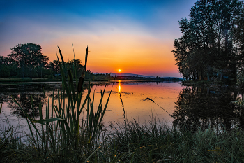 Sonnenuntergang über dem See / ***