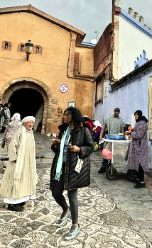 Cultural interaction / A western lady on the streets of Morocco