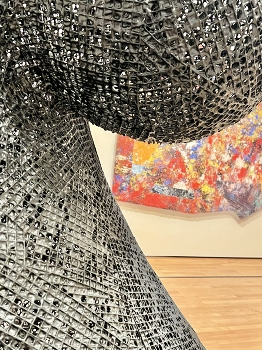 Contemporary art exhibition / Metal structure in front of a painting