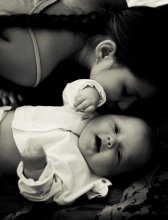 Vom ersten Tag an mit Zärtlichkeit und Zuneigung eingewickelt / ***