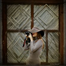 ein Mädchen mit einer Kamera / http://vkontakte.ru/id17373439