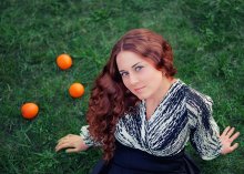 Eine Frau mit Orangen / ***
