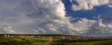 Auf der Straße mit Wolken / ***