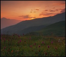 Sonnenuntergang in den Bergen / ...