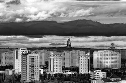 City / ***