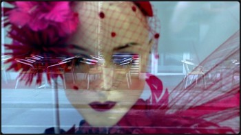 butterfly girl / natural reflections on the glass mixing with mannequin's face