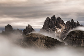 &quot;Dramatic sunrise&quot; Cadini di Misurina - Dolomites / The Cadini di Misurina are a mountainous group of the eastern Dolomites in the province of Belluno. They lie west of Auronzo di Cadore, north-east of Cortina d'Ampezzo and south of Dobbiaco, in a position overlooking the lake of Misurina. The highest peak is the Cima Cadin di San Lucano (2,839 m s.l.m.). They are part of the subsection Dolomiti di Sesto, of Braies and d'Ampezzo and belong to the municipality of Auronzo di Cadore. The term Cadini derives from the Cadore Ciadìn (Ciadìs in the plural) that can be translated into valleys, of which the chain is full and makes the whole of the peaks a labyrinth.