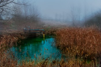 Pumpstation / Small lake at a gravel pit with very clean and green water.