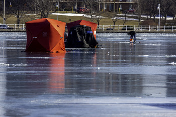 Ice Fishing the Bay / They were ice fishing at the Sarnia Bay
