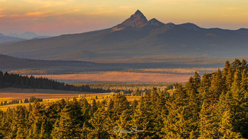 Mt. Thielson Sunset / Sunset over the valley reaching out to Mt. Thielson. Taken from the crater edge of Mt. Mazama, Crater Lake National Park