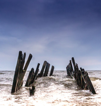 &nbsp; / Old pier slowly being consumed by the sea