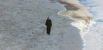 Jaffa / nun on the shores of Jaffa